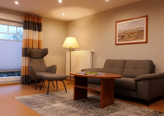 Wohnzimmer in einer Ferienwohnung in Cuxhaven Duhnen